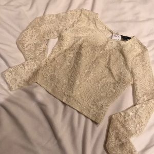 off white lace long sleeved crop top